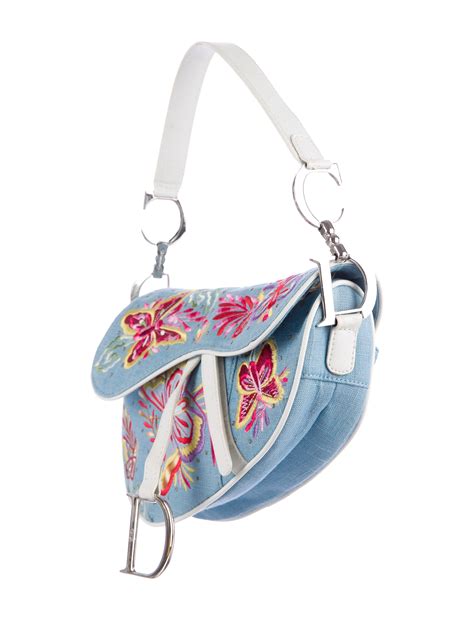 christian dior butterfly saddle bag.